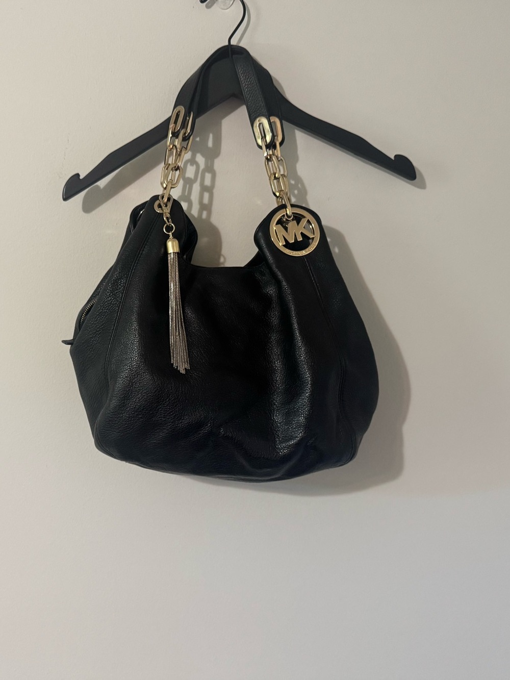 Michael Kors Black Leather Shoulder Bag with Gold Chain and Tassel